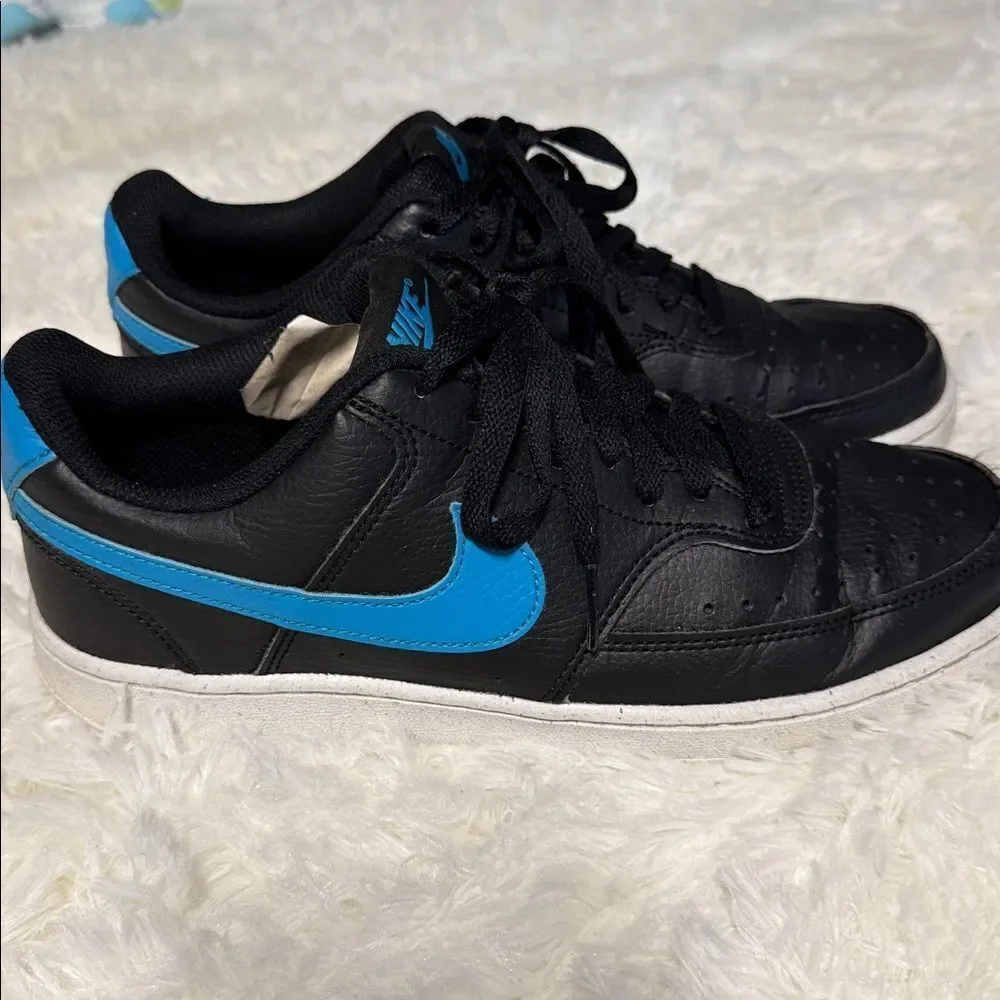 Nike Black Sneakers with Blue Highlights